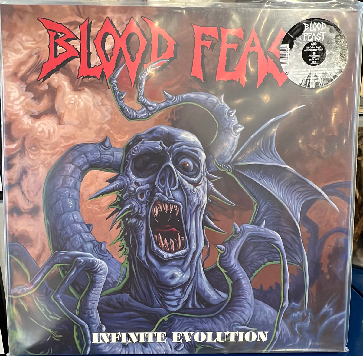 BLOODFEAST - Infinite Evolution LP (TRI-COLOR VARIANT)